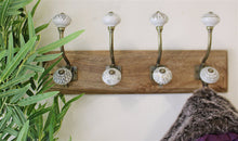 Load image into Gallery viewer, 4 Double Ceramic Ivory Coat Hooks On Wooden Base
